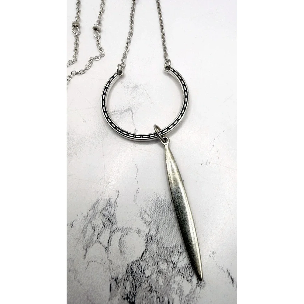 Source Unknown long silver